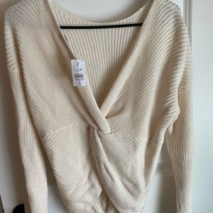 Open back twist sweater
